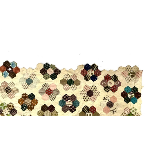 1612 - An early 20th century honeycomb patchwork quilt. 180cm x 160cm.