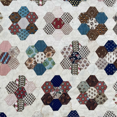 1612 - An early 20th century honeycomb patchwork quilt. 180cm x 160cm.