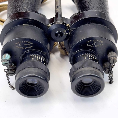 163 - A pair of WWII British Naval binoculars by Barr & Stroud. 7 X CF2 with leather case, together with a... 