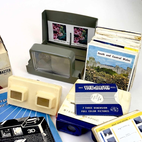 164 - A 3D View-master viewer together with many View-master reels. The 3-D VistaScreen viewer and VistaSc... 