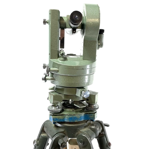 167 - A Vickers Instruments Cooke V11 theodolite, with tripod and measure. (3)