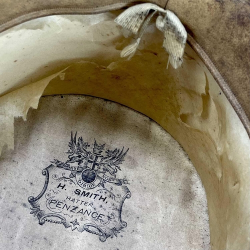 168 - A Victorian top hat, labelled for 'H.Smith, Hatter, Penzance', in leather case.