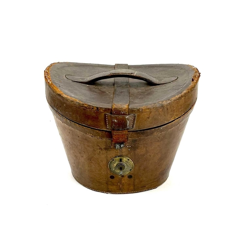 168 - A Victorian top hat, labelled for 'H.Smith, Hatter, Penzance', in leather case.