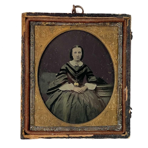 17 - A Victorian tinted Ambrotype portrait photograph by Mr & Mrs Grocott, Manchester. Of a young girl be... 