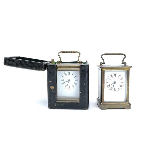 1704 - A French brass cased carriage timepiece. Early 20th century, contained in a green Morocco leather ca... 