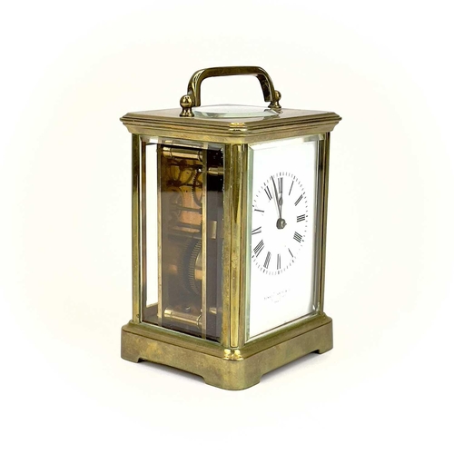 1707 - A French brass carriage clock. Circa 1900, the dial marked Howell James & Co to the Queen Paris, hei... 