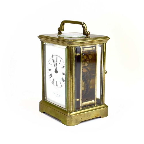 1707 - A French brass carriage clock. Circa 1900, the dial marked Howell James & Co to the Queen Paris, hei... 