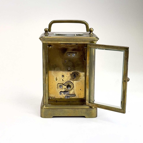 1707 - A French brass carriage clock. Circa 1900, the dial marked Howell James & Co to the Queen Paris, hei... 