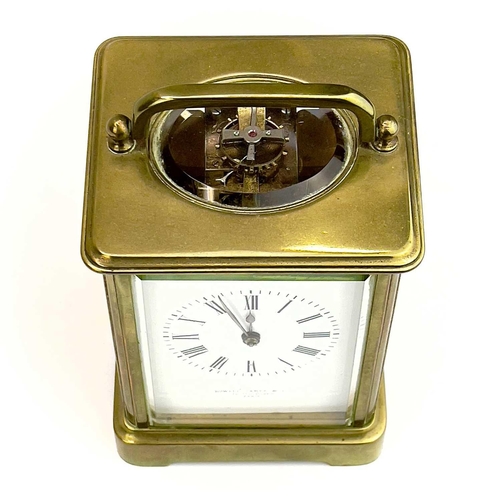 1707 - A French brass carriage clock. Circa 1900, the dial marked Howell James & Co to the Queen Paris, hei... 