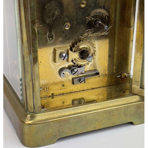 1707 - A French brass carriage clock. Circa 1900, the dial marked Howell James & Co to the Queen Paris, hei... 