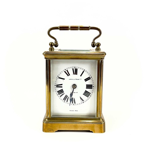 1711 - A French brass cased carriage timepiece, retailed by Mappin & Webb, London. Circa 1900, with travel ... 