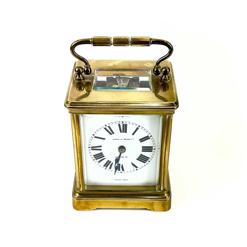 1711 - A French brass cased carriage timepiece, retailed by Mappin & Webb, London. Circa 1900, with travel ... 