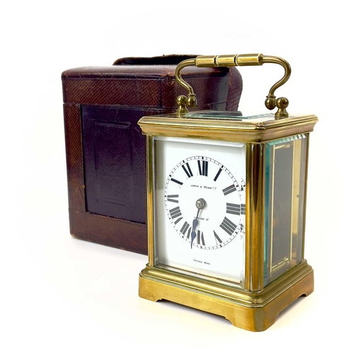 1711 - A French brass cased carriage timepiece, retailed by Mappin & Webb, London. Circa 1900, with travel ... 