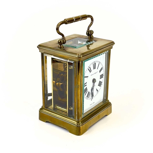 1711 - A French brass cased carriage timepiece, retailed by Mappin & Webb, London. Circa 1900, with travel ... 