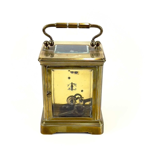 1711 - A French brass cased carriage timepiece, retailed by Mappin & Webb, London. Circa 1900, with travel ... 