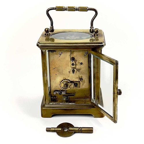 1712 - A French brass cased carriage timepiece. Early 20th century, the base stamped CH, height 10.5cm.