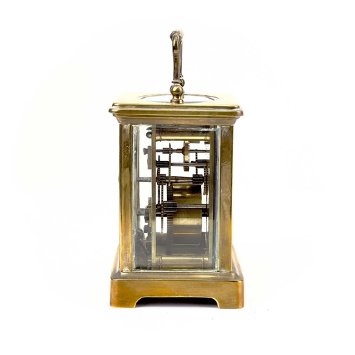 1712 - A French brass cased carriage timepiece. Early 20th century, the base stamped CH, height 10.5cm.