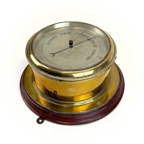 1715 - A Benson brass marine aneroid barometer. Circa 1900, the silvered dial stamped Compensated Benson Lu... 