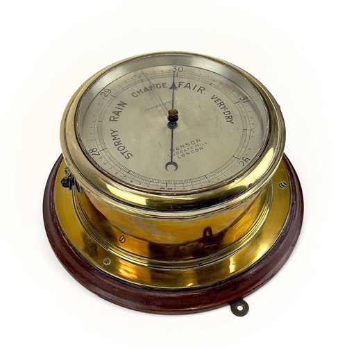 1715 - A Benson brass marine aneroid barometer. Circa 1900, the silvered dial stamped Compensated Benson Lu... 