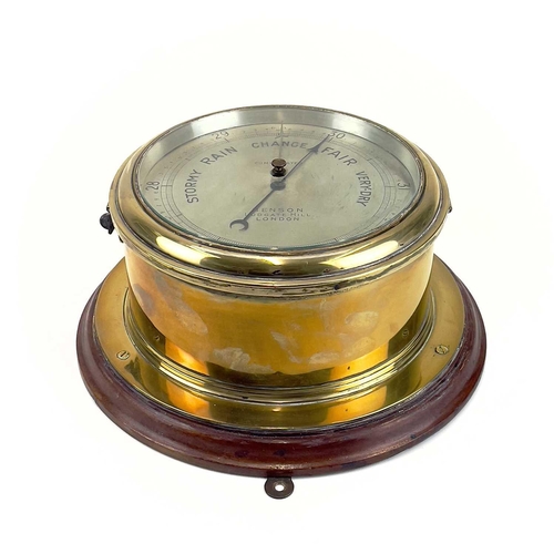 1715 - A Benson brass marine aneroid barometer. Circa 1900, the silvered dial stamped Compensated Benson Lu... 