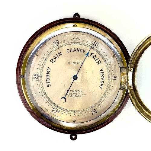 1715 - A Benson brass marine aneroid barometer. Circa 1900, the silvered dial stamped Compensated Benson Lu... 