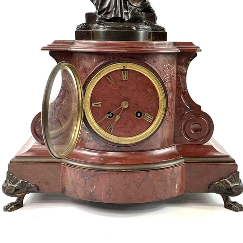 1719 - A 19th century French red marble mantle clock with a bronze figure of girl holding a small casket Si... 