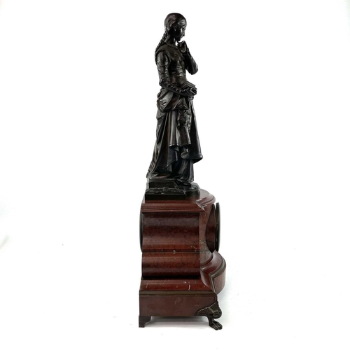 1719 - A 19th century French red marble mantle clock with a bronze figure of girl holding a small casket Si... 