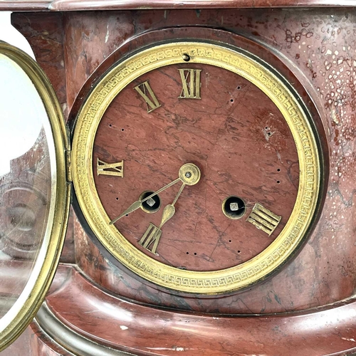 1719 - A 19th century French red marble mantle clock with a bronze figure of girl holding a small casket Si... 