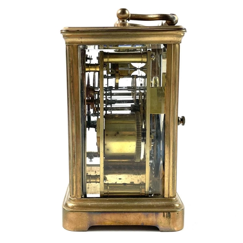 1722 - A French brass carriage clock. Striking on a coiled gong, leather case, height 13.5cm.