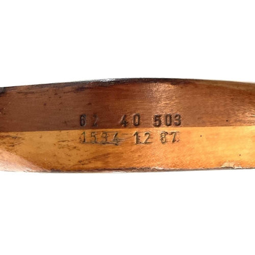 18 - A 20th century laminated wood propeller. The hub is stamped 62 40 508 153412 87, length 157.5cm.