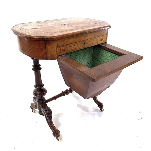 1803 - A Victorian walnut and inlaid work/writing table. The hinged top revealing an adjustable writing slo... 