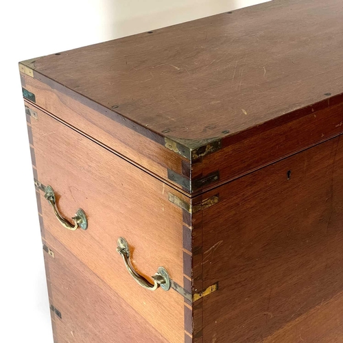 1811 - A large teak and camphor wood military type brass bound chest. Mid 19th century, with twin end handl... 