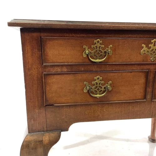 1814 - A George III mahogany side table or lowboy. Fitted with a long drawer above two short drawers and ra... 