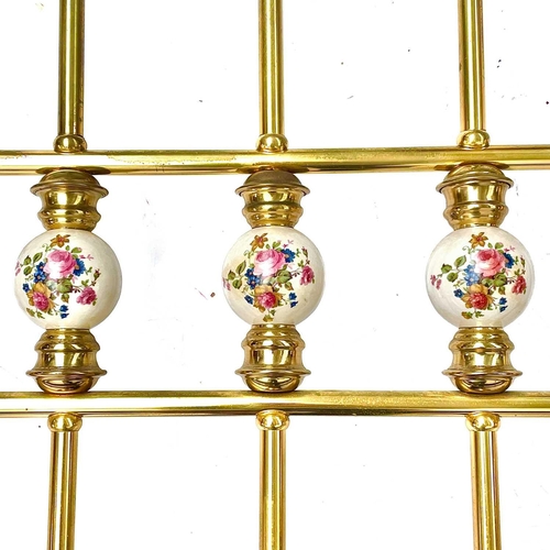 1819 - A Victorian style brass bed head and end. The rails with floral printed ceramic dividers, to take a ... 