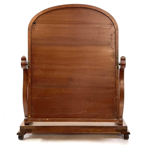 1825 - A Victorian mahogany swing toilet mirror. With shaped supports on a platform base, height 78cm, widt... 