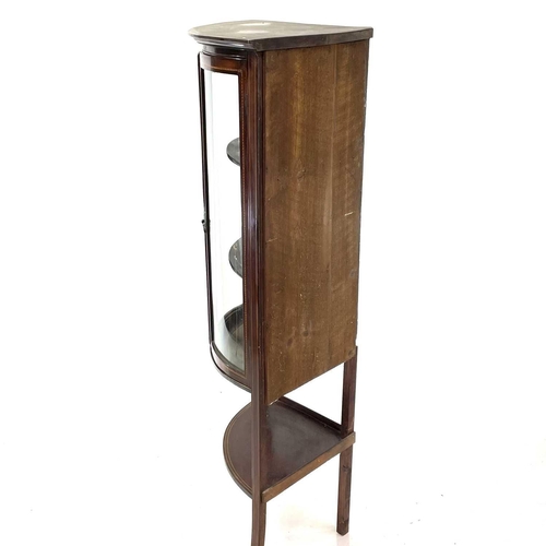 1831 - A late Victorian mahogany and inlaid bow front corner display cabinet. With an under tier and raised... 