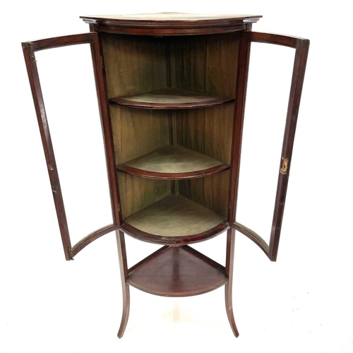 1831 - A late Victorian mahogany and inlaid bow front corner display cabinet. With an under tier and raised... 