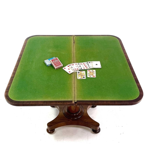 1832 - An early Victorian rosewood fold top card table. On a turned column and quadruped base. Height 74cm,... 