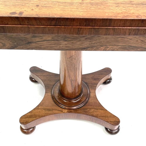 1832 - An early Victorian rosewood fold top card table. On a turned column and quadruped base. Height 74cm,... 