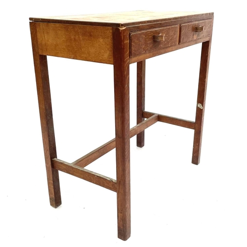 1833 - An oak Arts & Crafts side table. Fitted with two drawers and raised on square legs with stretchers. ... 