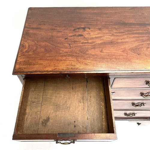 1835 - A George II mahogany chest. With a brushing slide, above two short and three long graduated drawers,... 