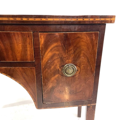 1838 - A 19th century mahogany bow front sideboard. Fitted a central drawer flanked by two deep drawers and... 