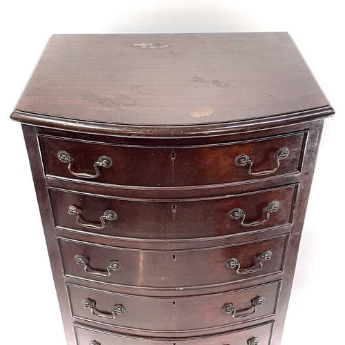 1849 - A mahogany bow front cabinet. Mid 20th century, fitted with five long drawers with a two door cupboa... 