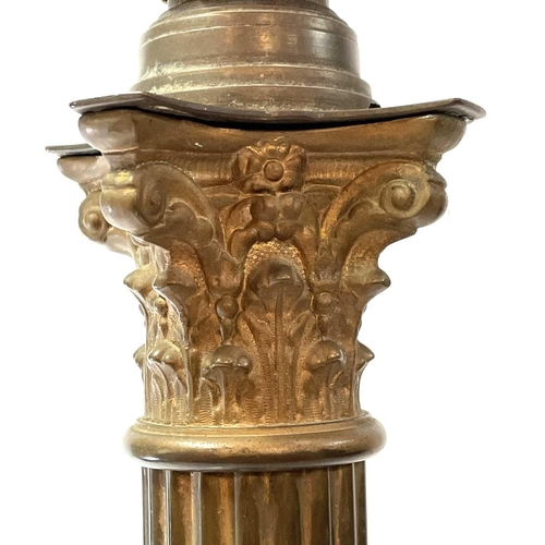 1854 - A Victorian brass Corinthian column lamp standard. Raised on a stepped square base, height 121cm, co... 