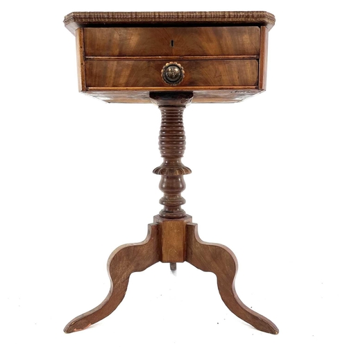 1855 - A Continental figured mahogany work table. Mid 19th century, with hinged top and with a lower fitted... 