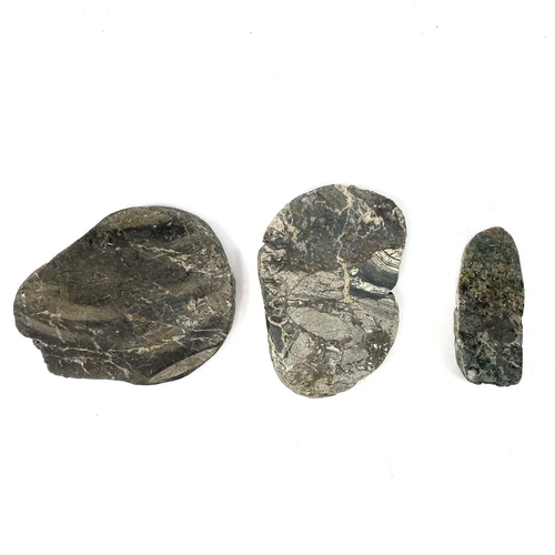 186 - Three cut cassiterite specimens from Trevaunance Cove, St Agnes. Accompanied by a modern bar ingot o... 