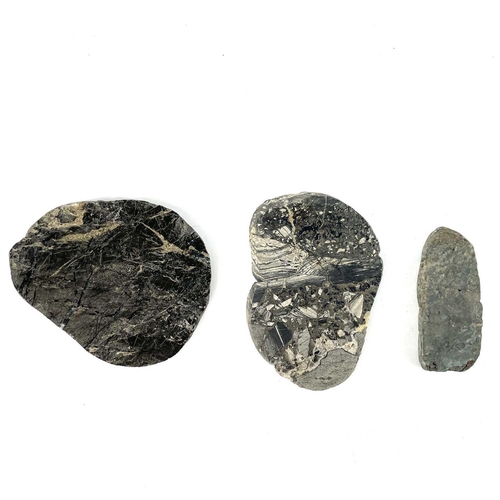 186 - Three cut cassiterite specimens from Trevaunance Cove, St Agnes. Accompanied by a modern bar ingot o... 