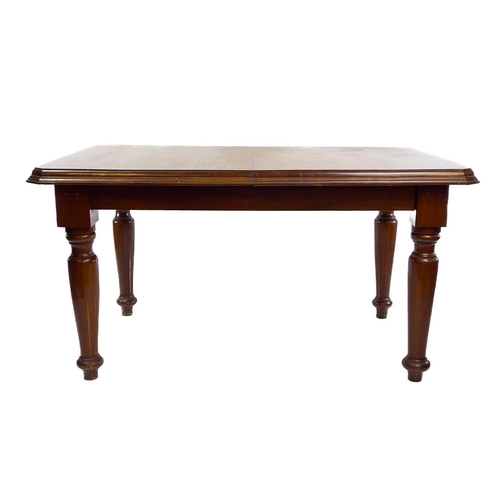 1861 - A late Victorian mahogany extending dining table. With wind-out action and an extra leaf, on turned ... 