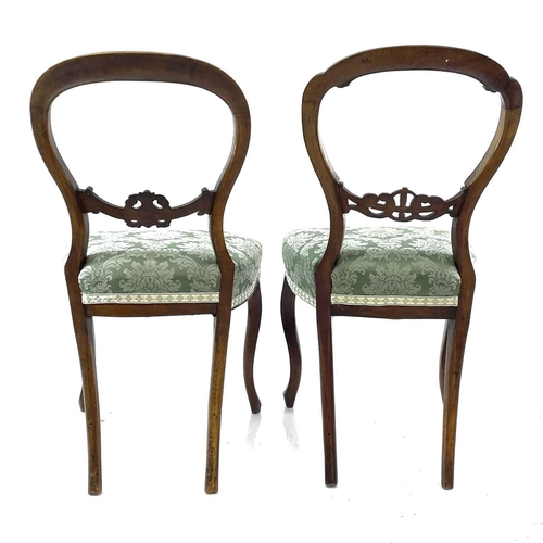 1862 - A set of three Victorian walnut balloon back dining chairs. Together with two very similar (5).