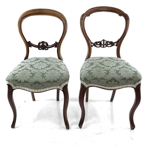 1862 - A set of three Victorian walnut balloon back dining chairs. Together with two very similar (5).